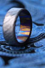 Stone ZrTi 8mm lined in dragons breathe ZrTi ring 3mm-9mm wide timascus ring, mokuti ring