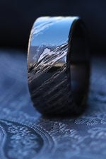 Stone weathered 6mm-10mm wide timascus ring, black titanium lined