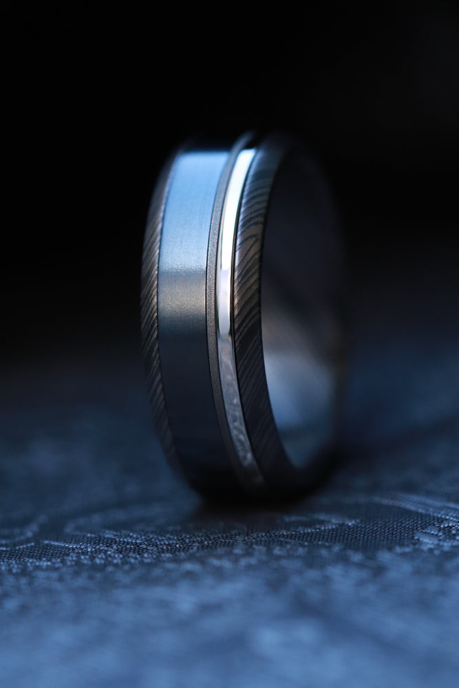 Platinum zirconium damascus black titanium ring