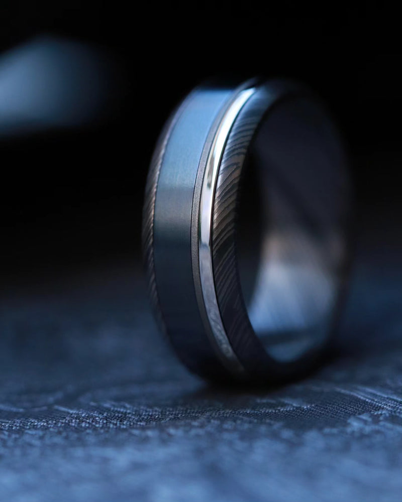 Platinum zirconium damascus black titanium ring