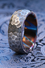 Weathered pattern domed titanium damascus ring