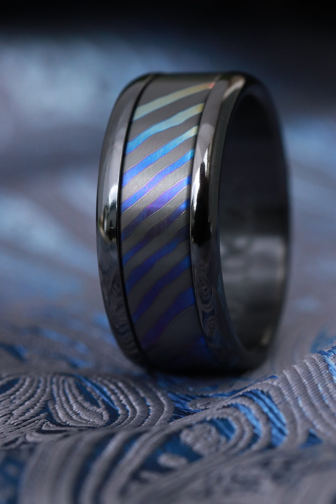 Black titanium and timascus titanium zirconium ring