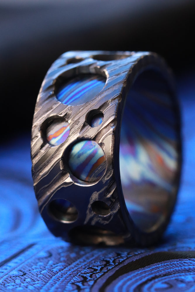 The "bio-mech" asteroid band! Zrti weathered 12mm customizable timascus band zirconium titanium damascus zrti