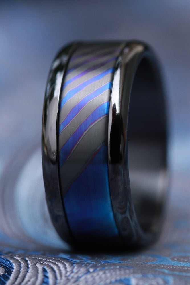 Black titanium and timascus titanium zirconium ring