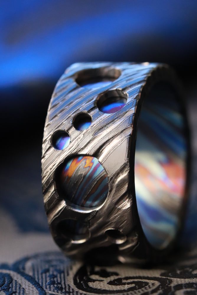 The "bio-mech" asteroid band! Zrti weathered 12mm customizable timascus band zirconium titanium damascus zrti