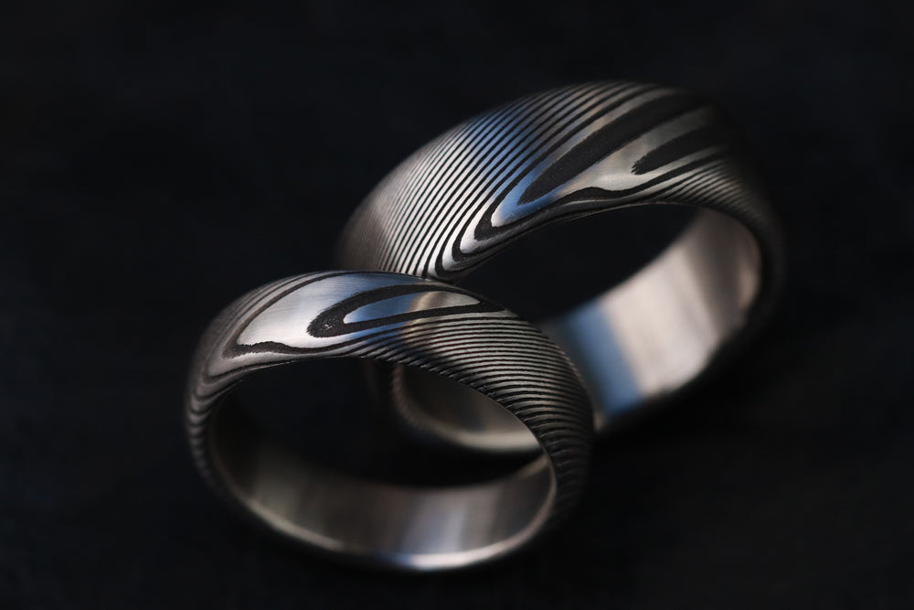 Two Genuine Damascus ring set - Stainless steel Damascus damasteel "TRADITIONAL" woodgrain pattern with a twist rings! Damascus steel ring his and hers set