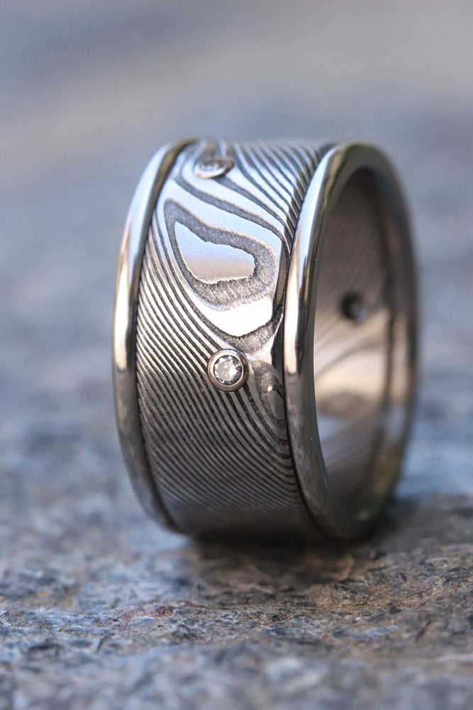 Diamonds and damasteel 12mm customizable ring damascus wave