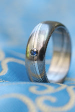 Damasteel ring 7mm wide /  2mm deep blue sapphire 14k gold customizable