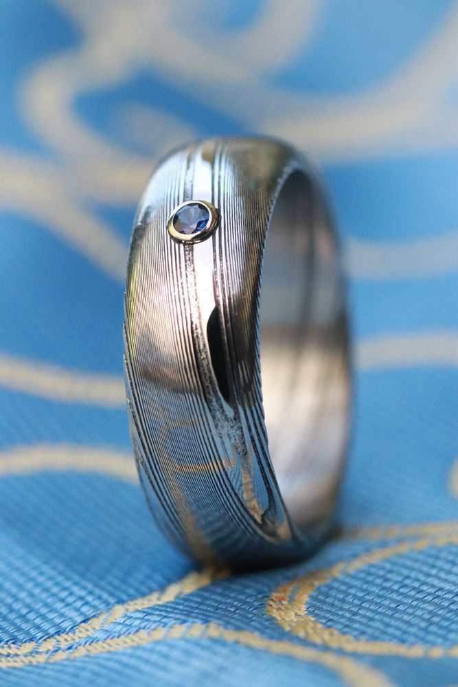Damasteel ring 7mm wide /  2mm deep blue sapphire 14k gold customizable