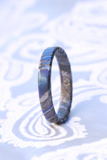 Deep Black ZrTi ring 3mm-9mm wide timascus ring