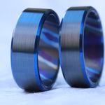 Matching set of two Black & blue titanium ZrTi band black titanium